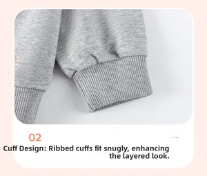 Detail of grey ribbed cuffs on cotton sweatshirt for boys, focus on high-quality stitching