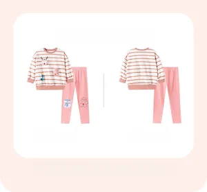 Flat lay of pink striped toddler Christmas set with reindeer applique and snowmen pants