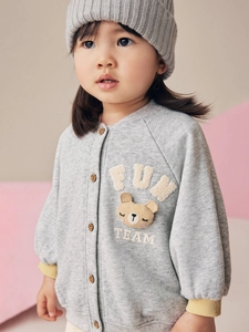 Baby girl grey cardigan set with 3D bear patch and knit hat on a soft backdrop