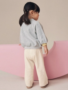 Girls casual two-piece set featuring grey cotton sweatshirt and beige straight trousers