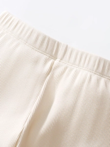 Meisjes gebreide legging in crème met geribbelde textuur en elastische tailleband