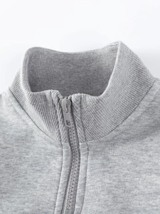 Gray cotton boys sweatshirt featuring a ribbed neckline and high-quality resin zipper detail