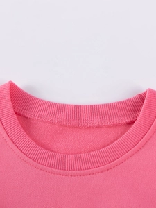 Pink crewneck cotton sweatshirt for girls featuring a ribbed collar and neat stitching