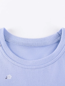 Abito in cotone viola chiaro per bambina con girocollo classico e motivi floreali