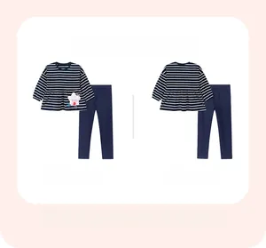 Detail of girls' navy striped long sleeve top and pants set with cute sheep embroidery
