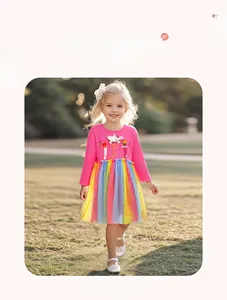 Detail of girls long sleeve dress featuring rainbow tulle skirt and mouse embroidery