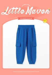Detail of bright blue cargo jogger pants for boys featuring elastic waist and side pockets