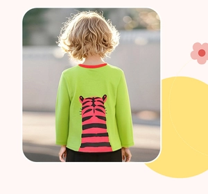 Detail of green long-sleeve cotton boy's t-shirt with orange tiger print on back