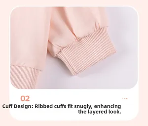 Detail of soft pink ribbed elastic cuffs on the long sleeve cotton blend toddler sweatshirt