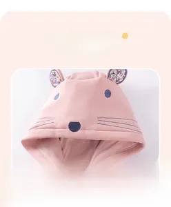Close-up of pink baby hoodie featuring 3D animal ears with floral lining and cute embroidery