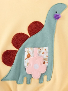 Sweatshirt enfant en coton jaune avec applique dinosaure bleue et détail de fleur en 3D