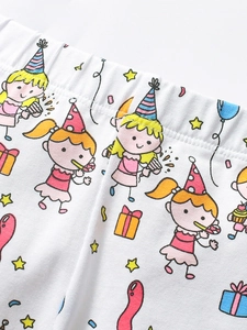 Pantalon enfant en coton polaire avec imprimés festifs colorés et taille élastiquée