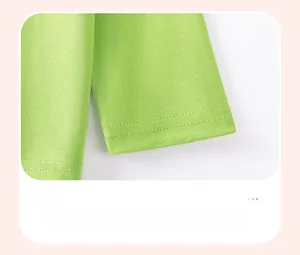 Detail view of cotton t-shirt sleeve cuff with double-needle stitching in grass green