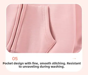Close-up of durable pocket stitching on soft pink fleece hoodie for toddlers