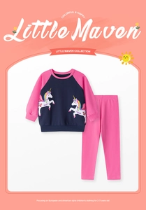 Detail of girls' cotton tracksuit featuring unicorn prints and pink leggings for ages 2-7