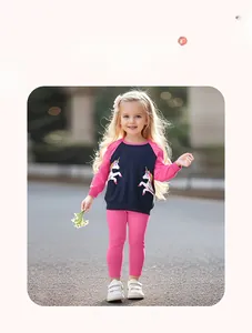 Detail of girls cotton set with white unicorn print on pink and navy blue sweatshirt