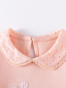 Pink girl's long sleeve top with embroidered Peter Pan collar and soft cotton fabric
