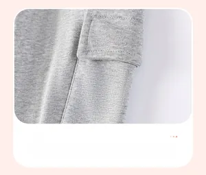 Detailed close-up of the grey knit boys' cargo pants featuring a flap side pocket design