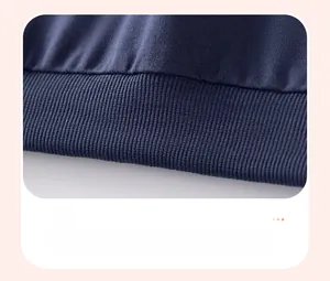 Detail of the navy blue ribbed hem on children knitwear for durability and stretch