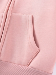 Pink fleece hoodie for kids featuring a zipper front, kangaroo pockets, and ribbed hem