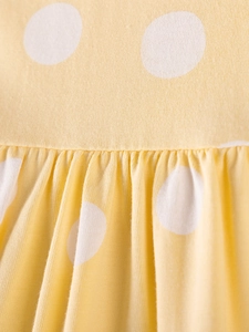 Yellow polka dot cotton dress for girls with soft knitted texture and pleated design