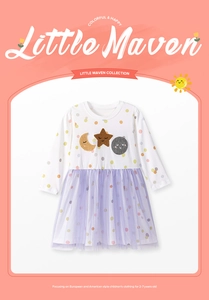 Close-up of girls' long sleeve dress featuring moon and star embroidery on dot print mesh