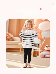Girl wearing striped cotton sweatshirt with lace collar and black knitted pants set