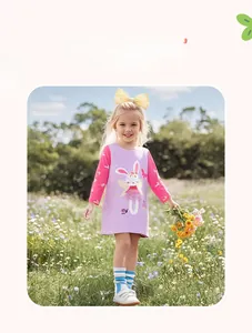 Detail of girls' long-sleeve cotton dress with cute rabbit print and pink sleeves