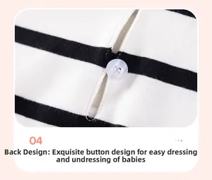 Detail of the back opening with a clear button on the striped cotton baby shirt
