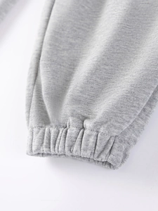 Boys heather grey knit cargo pants featuring elastic ribbed cuffs and premium fabric texture