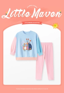 Detail of girls' blue long-sleeve sweatshirt featuring rainbow ladybug patch and pink pants
