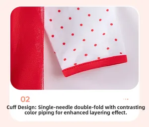 Détail des manches de robe en tulle de Noël avec bordure rouge contrastée et pois