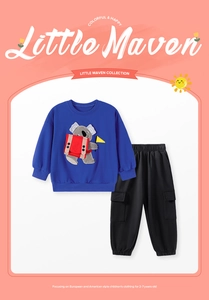 Close-up of blue sweatshirt with cute koala embroidery and black cargo pants for kids