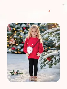 Detail showing toddler girl Christmas striped sweater with plush Santa crossbody bag