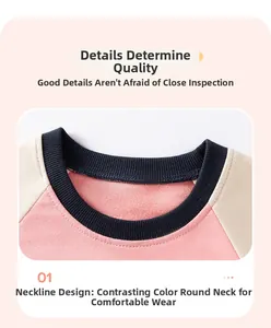 Close-up of contrast ribbed crew neck on soft cotton pink and white girl sweatshirt