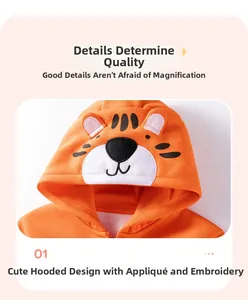 Detailed view of the orange toddler hoodie featuring a 3D tiger face hood with embroidery