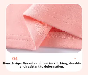 Detail of pink knitted girl's outfit showing fine stitching and smooth hem design