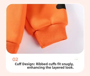 Macro view of elastic ribbed cuffs on a boys orange fleece sweatshirt for autumn