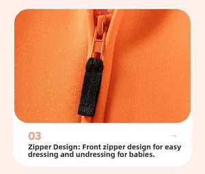 Close-up of bright orange zipper with black woven puller for easy toddler dressing