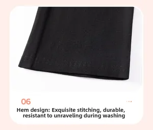 Detailed close-up of girls' black leggings with durable double-needle stitching on the cuffs