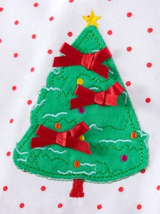 Broderie sapin de Noël sur robe de fille à pois rouges avec nœuds et étoiles