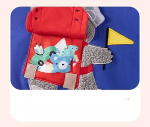 Detail of blue cotton boy sweatshirt featuring an interactive koala embroidery with flip-open bag