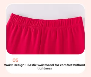 Detail of red elastic waistband on girls' Christmas outfit showing stitching and texture