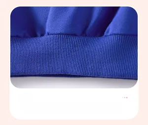 Close-up of the ribbed hem design on a royal blue cotton sweatshirt for kids