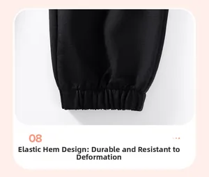 Close-up of elastic ribbed cuffs on boys' black fleece joggers for durability