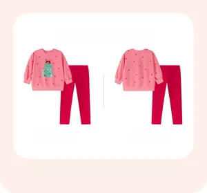 Flat lay of pink Christmas tree sweatshirt and red pants set with front and back views