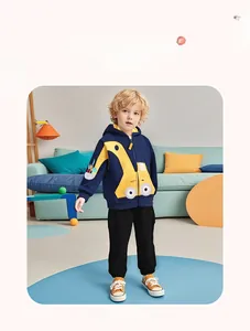 Detail of navy zip-up hoodie featuring a yellow excavator patch and cargo pants for boys
