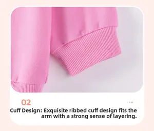 Detailed close-up of pink long-sleeve knit top with elastic ribbed cuffs for girls