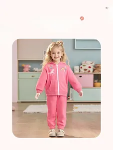 Detail of pink fleece hoodie set with unicorn embroidery and matching joggers