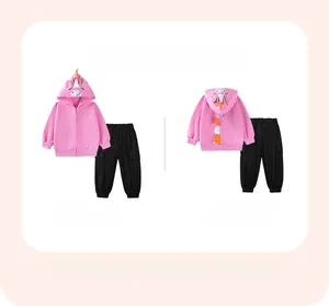Front and back view of girls pink unicorn hoodie set with 3D horn and black cargo pants
